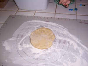 Using a well floured pastry mat, mine is silicone, pat the dough into a nice circle